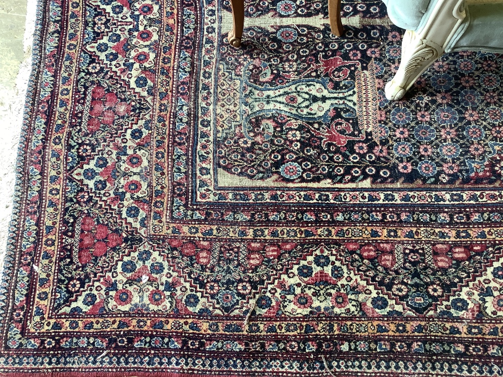 An Isphahan blue ground rug, 248 x 140cm